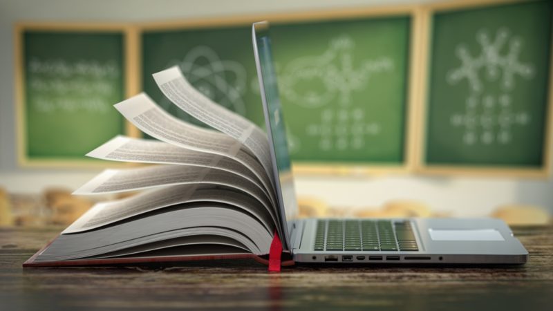 laptop and book elearning