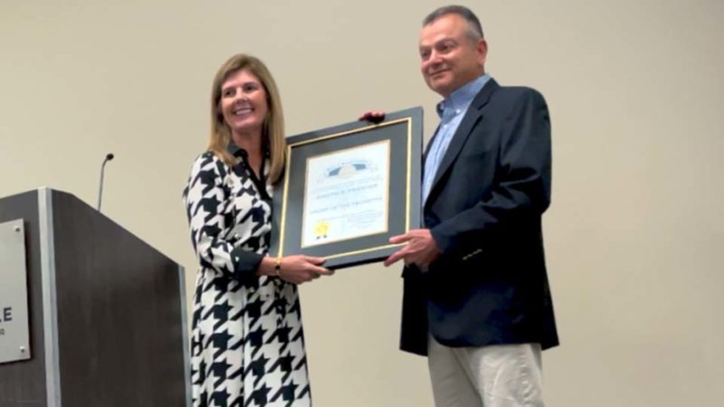 Lt. Gov Pamela S. Evette presents the Order of the Palmetto to Joseph R. Frasher