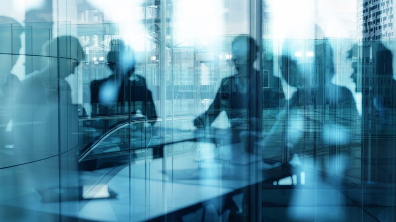 business people around desk