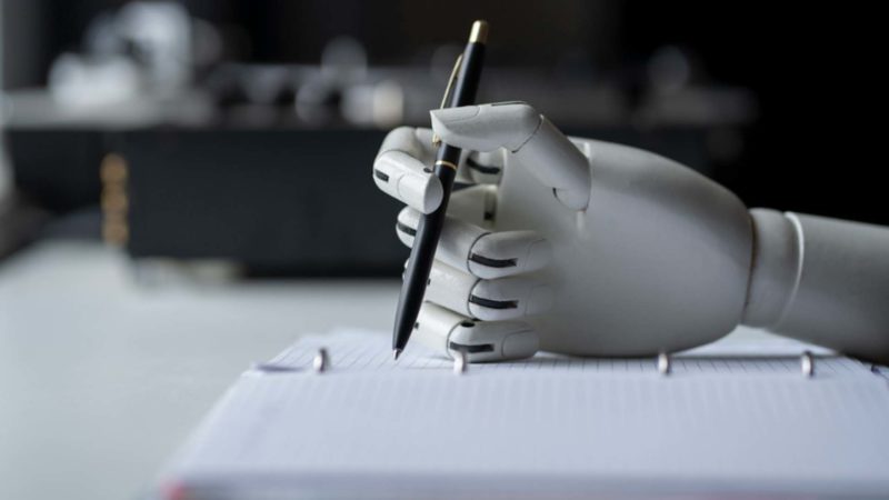 artificial robotic arm writing